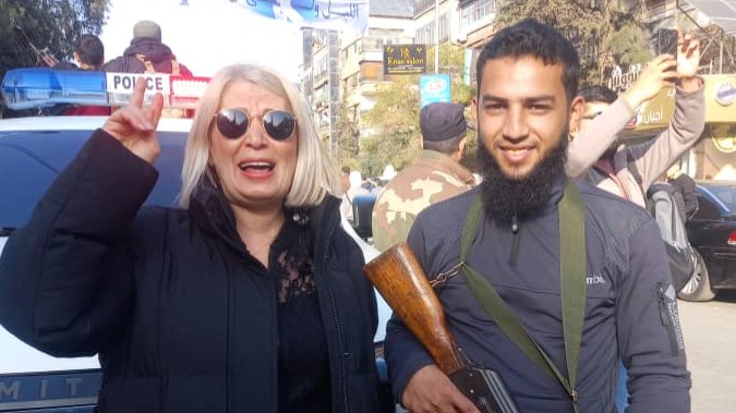 “A shot with the policeman”: Syrian women celebrate public security as a symbol of the birth of a new state in Damascus