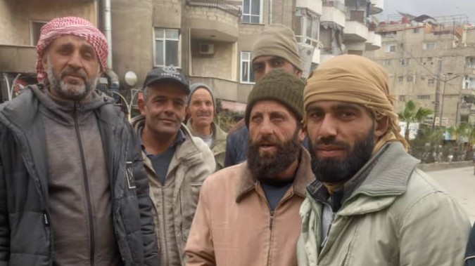 The porters of the squares in Jaramana... daily wait for a job opportunity that does not come