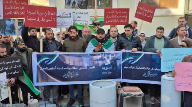 A symbolic protest in Damascus against the Mohammed Hamsho settlement reopens the transitional justice file