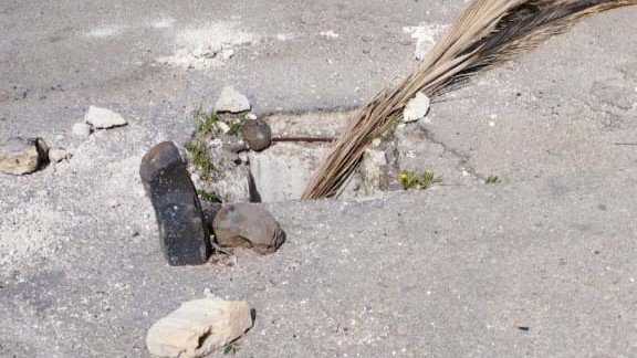 In Pictures: Missing Manhole Covers Pose a Danger in Al-Wa'r Neighborhood