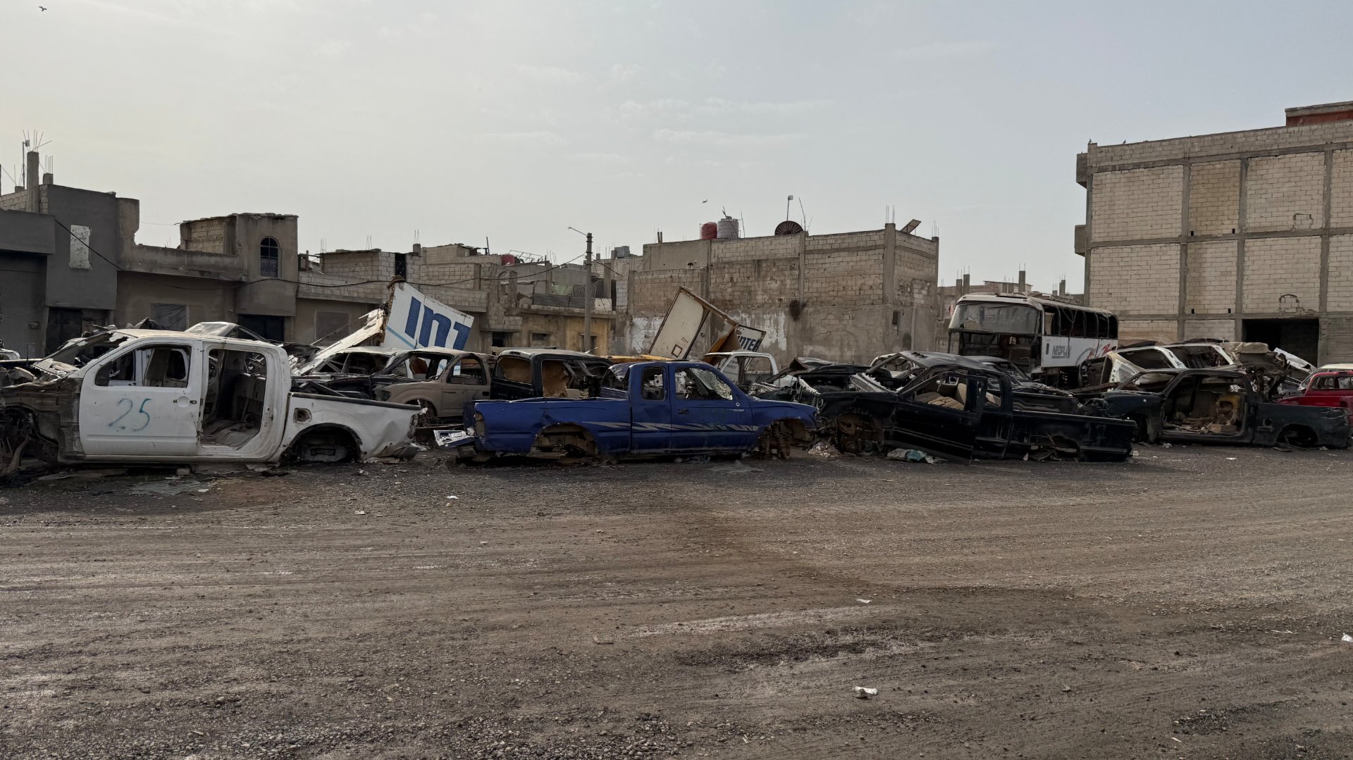 Removal of Wrecked and Burnt Car Wrecks from the Streets of Homs