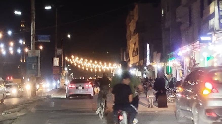 The streets of Baba Amr are decorated to welcome Eid